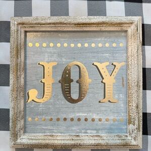 JOY wall sign